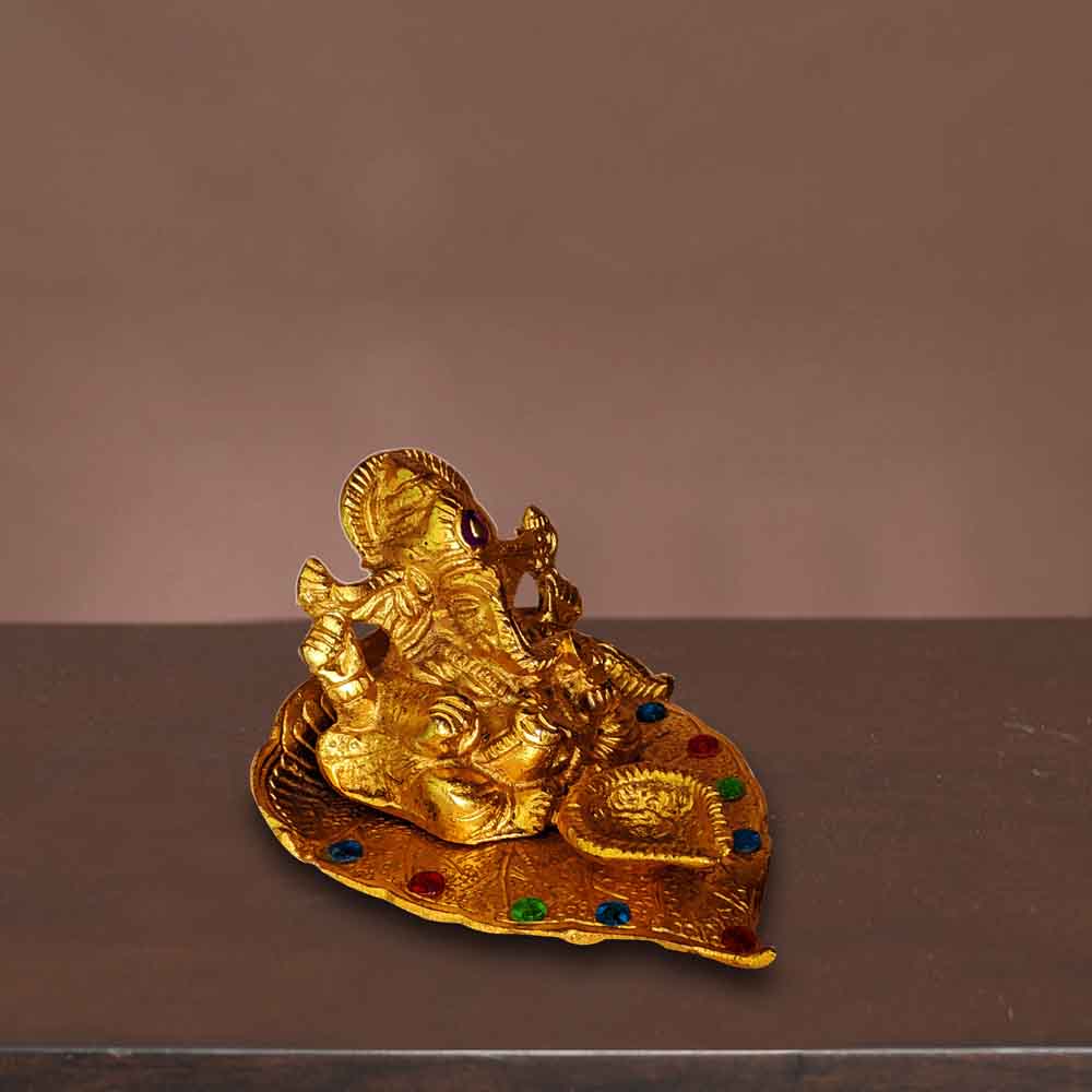 Metal Ganesha Idol On Leaf